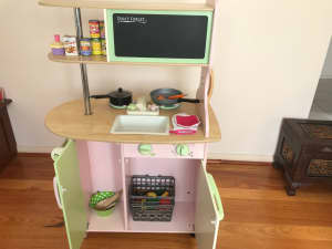 Used wooden kids play kitchen 
