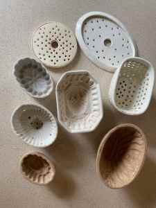ANTIQUE BUTTER MOULDS AND STRAINERS