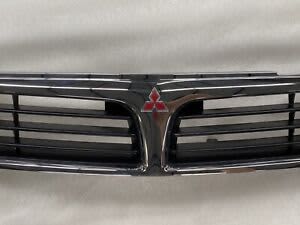 CE LANCER GRILLE 08/98 to 06/02 sedan AS NEW