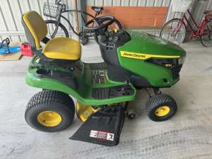 John Deer a ride on with Trailer and 12V sprayer