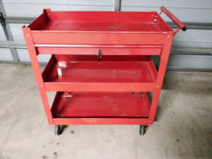 Red mechanics cart with lockable drawer 