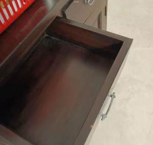 Dark brown table with 3 draws