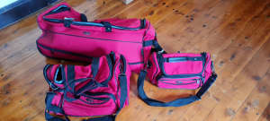 Drop bottom wheeled bag with other 2 matching packages