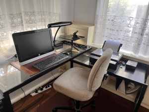 Glass desk with free swivel chair