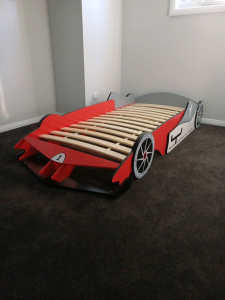 Free baby racing car bed Brand new. Needs to go today Sunday.