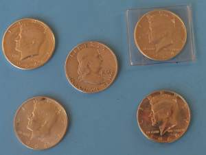 Silver US half dollars in VG circulated condition,