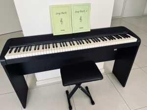 Korg Brand Digital Piano B1 with wooden stand in very good condition