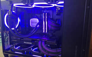 High-end Gaming PC with Ryzen 7 7700X CPU and Radeon RX 6700 XT GPU