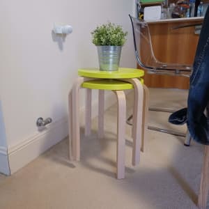 Two Ikea wooden round chairs