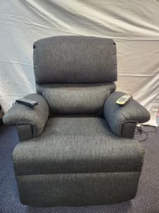 Single tilt and lift recliner with massager and heated seat