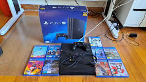 Playstation 4 (PS4) Pro 1 TB with controller and games