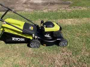 Four stroke Ryobi lawn mower, 160cc, near new with 12 month warranty.
