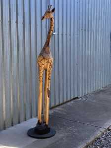 Carved wooden Giraffe statue