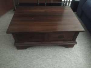 old imported coffee table, two draw sides, amazing design.