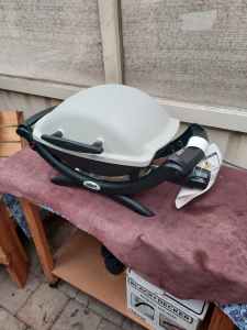 Weber baby Q1000 classic 2nd edition. Refurbished to new condition.