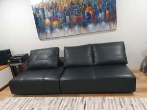 King living Strata II black leather armless chairs daybed theatre sofa