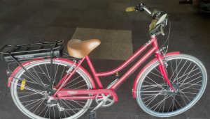 Hybrid, step though electric bike in excellent condition.