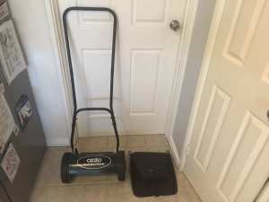 Push along lawnmower with grass catcher
