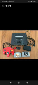 Nintendo 64 console plus controller and two games