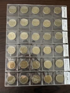 Lot of $1 coins in clear folders