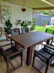 Solid Timber Dining Table and 6 Comfortable Timber and Mesh Armchairs