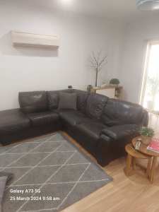 Leather lounge/Sofa L shaped with Ottoman 