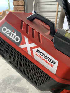 Ozito brushless 18v mower and battery 18months old