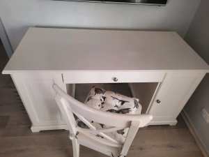 White Ikea desk and matching chair. Waste-paper basket also.