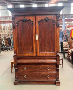 Grand 19th C. Flame Mahogany Robe Dresser with intricate wood carvings
