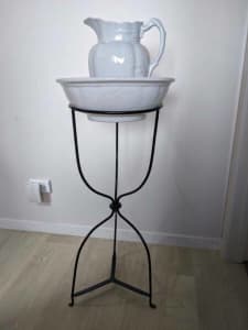 Wash bowl and jug with wrought iron stand