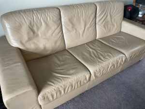 Free leather 3 seater lounge.