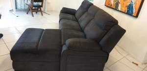Dark grey 3 seater couch - giving away 2 seats. Keeping 1 seat.