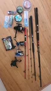Assorted fishing gear reels, bait, fishing line
