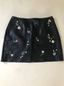 Size Large ZARA Mini Skirt with Flowers, Artificial Leather, $10.