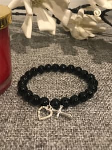 Black Onyx stretch bracelet with Heart & Cross charm