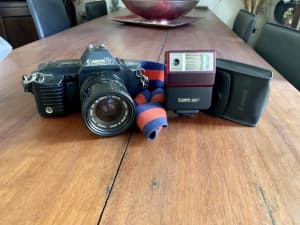 Canon SLR 35mm film camera T70 with canon 244T flash