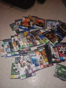 PlayStation 2 and 2 controllers heaps off games