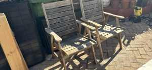 2 sturdy timber outdoor dining chairs
