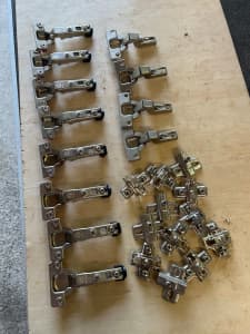 Lots of used and new cabinet hinges