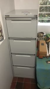 Four draw filling cabinet with folders 