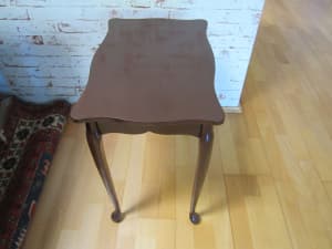 Small wooden table in good condition.