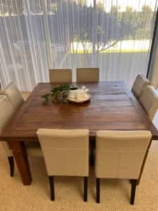Large 8 seater Balinese wooden teak dining table and 8 leather chairs