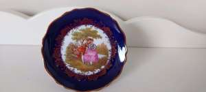 Small Limoges plate with stand. 11.5cms diameter. As new