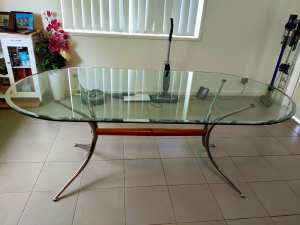 Stylish Italian made oval shaped glass dinning table, drop to $255