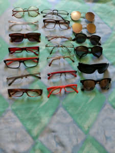 Lots of sunglasses and prescription glasses