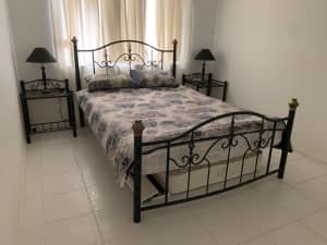 Queen size bedroom set with bedside tables and lamps 