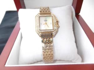 LADIES DRESS WATCH - NEW Y/GOLD CASE AND BAND SET WITH 94 STONES