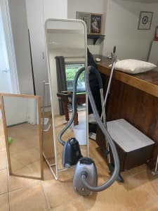 Mirror- vacuum cleaner- bedside table