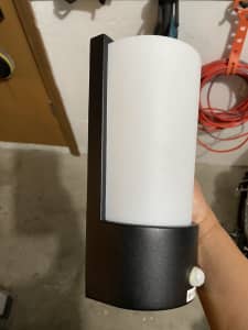 Two outdoor lights with sensors