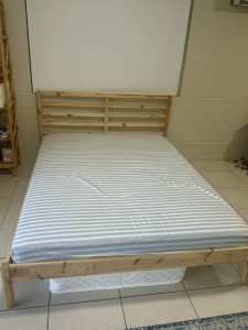 Queen solid wood bed - like new